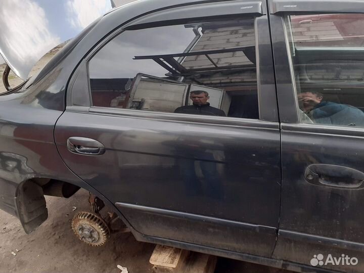 Задняя правая дверь Kia Spectra