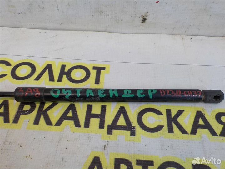 Амортизатор двери багажника Mitsubishi Outlander