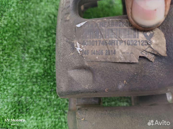 Суппорт тормозной передний Nissan Almera G15