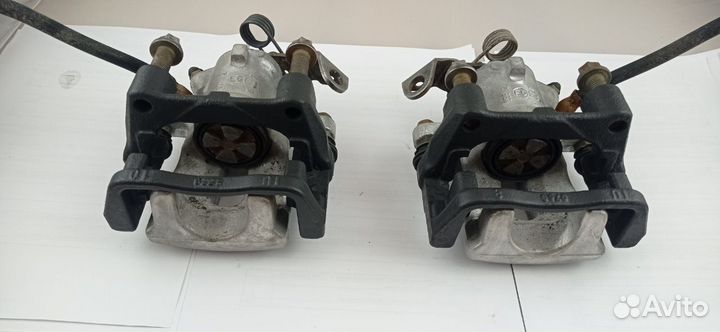 Суппорт тормозной задний Opel Astra G 1999