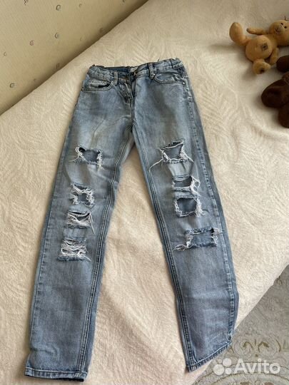 Джинсы на девочку 146