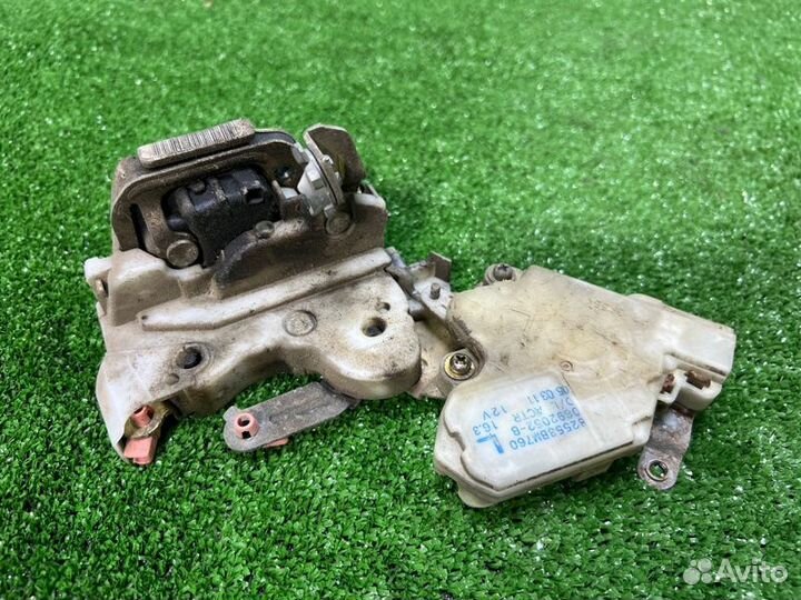 Замок боковой двери задний левый Nissan Almera N16