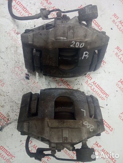 Суппорт тормозной передний Volkswagen Passat B6