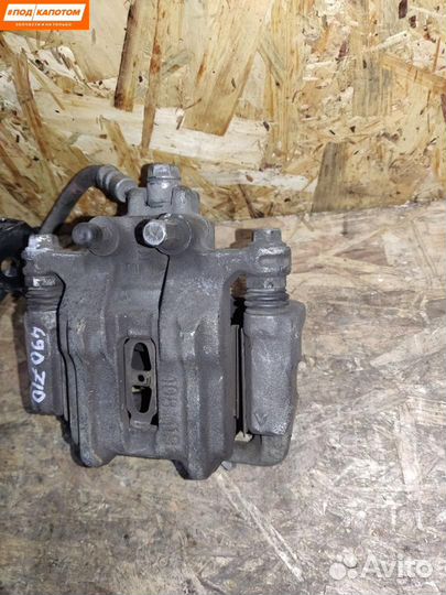 Суппорт тормозной задний левый Honda Accord 8