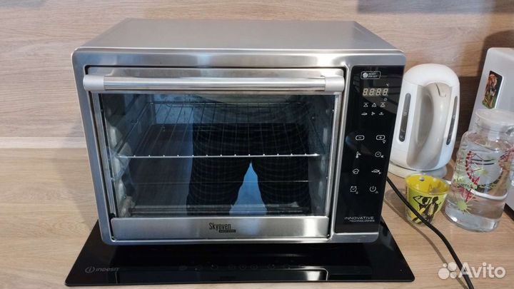 Духовой шкаф Redmond