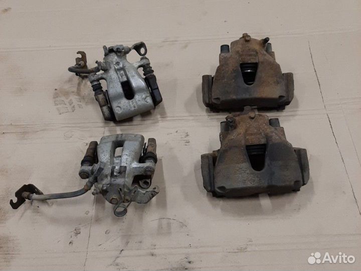 Суппорт тормозной Opel Astra H G Zafira A B