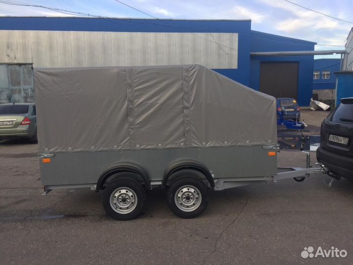 Двухосный бортовой прицеп