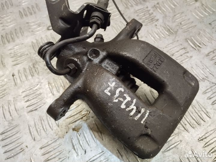 Суппорт задний левый Skoda Octavia A5