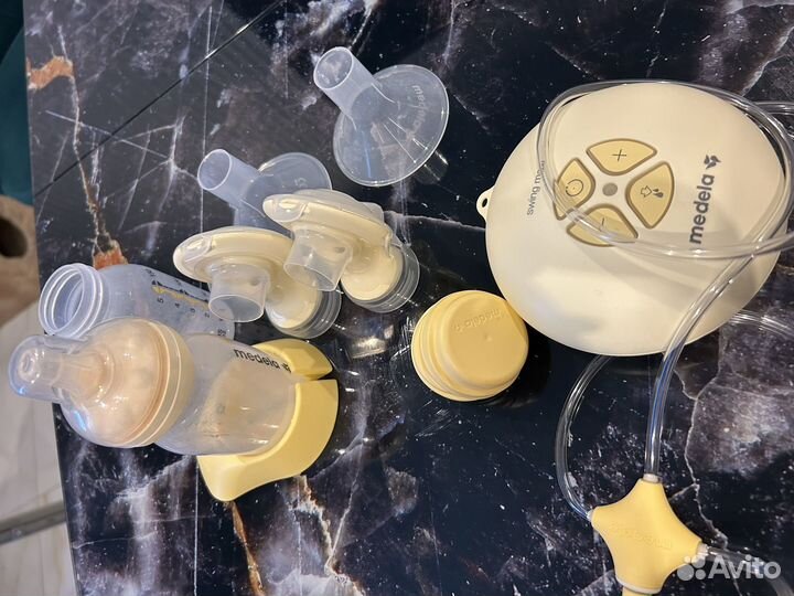 Молокоотсос medela