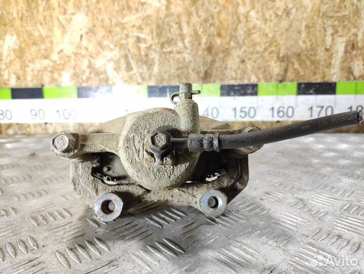 Суппорт передний правый Nissan Almera Classic