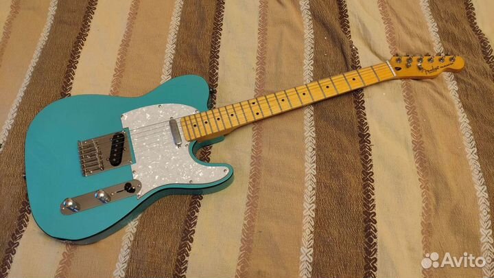 Реплика Fender Telecaster голубой с чёрным кантом
