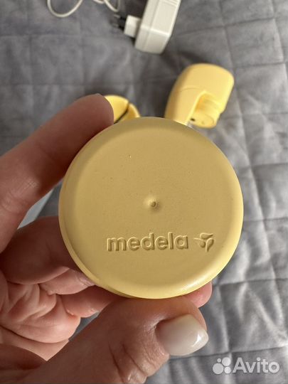 Молокоотсос medela электрический