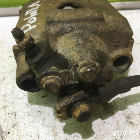 Суппорт передний левый Фольксваген Поло