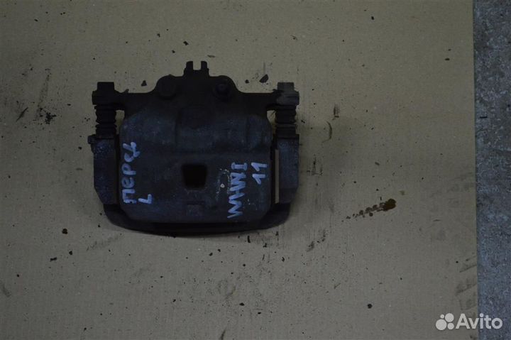 Суппорт передний левый Nissan Wingroad (Whny11) 1