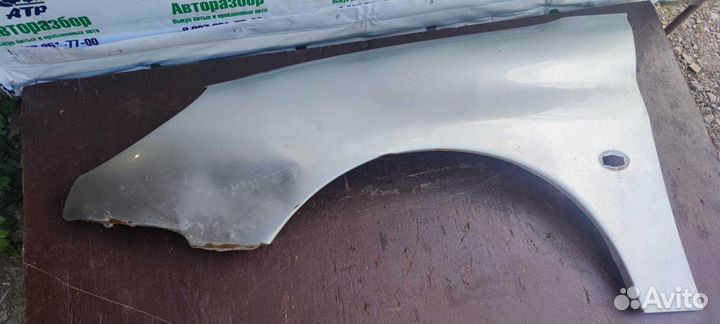 Крыло переднее левое Peugeot 206
