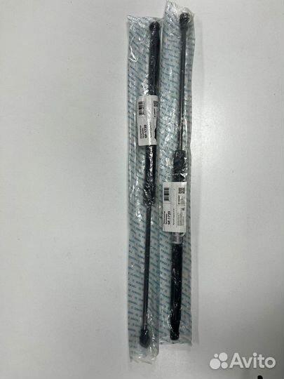 Газовый упор багажника Laguna