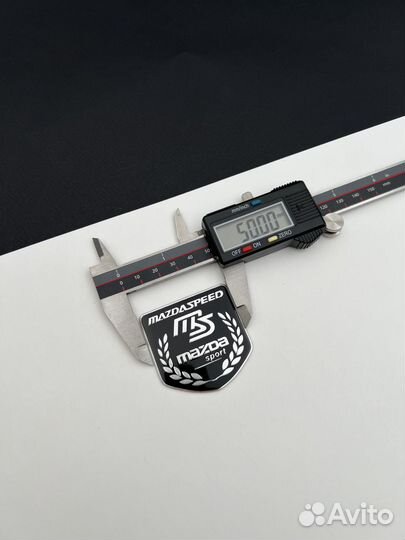Наклейка алюминиевая Mazda чёрная эмблема Мазда