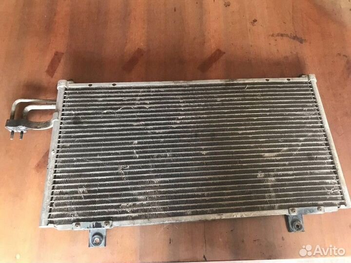 Радиатор кондиционера (конденсер) Kia Spectra