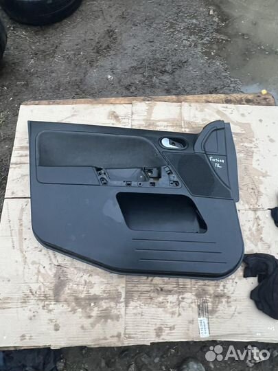 Обшивка двери передняя левая Ford Fusion