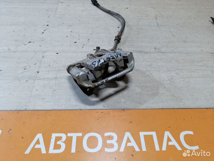 Суппорт тормозной задний Chevrolet Lacetti правый