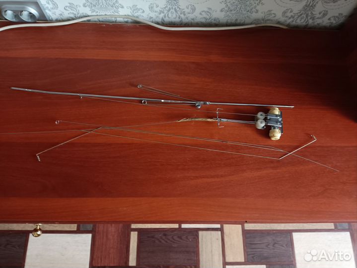 Нитенатяжитель