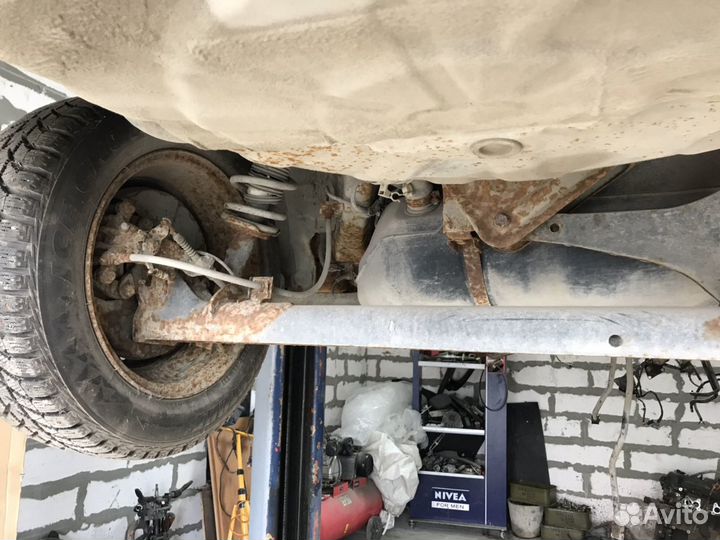 Nissan Almera Tino Задняя балка