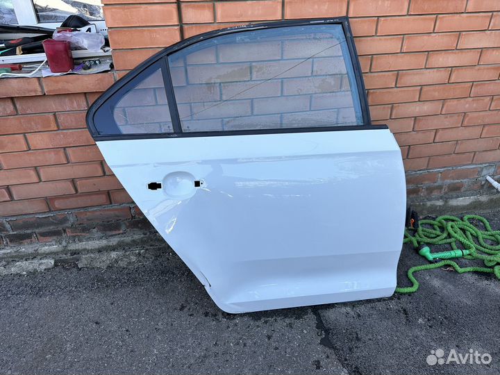 Дверь задняя правая шкода рапид