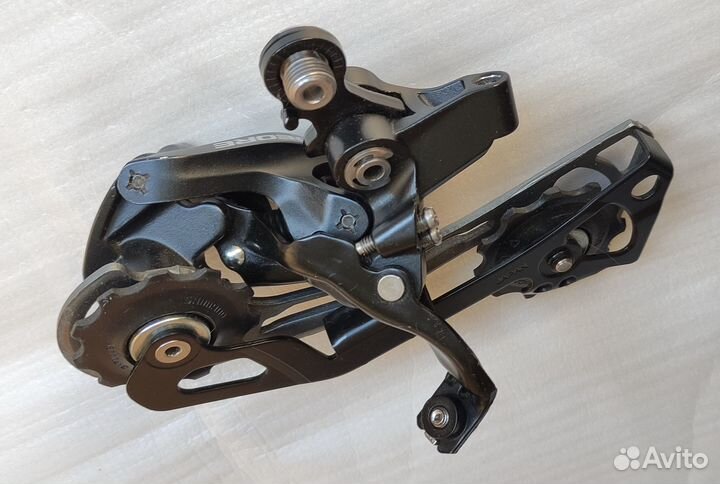 Переключатель задний Shimano M610