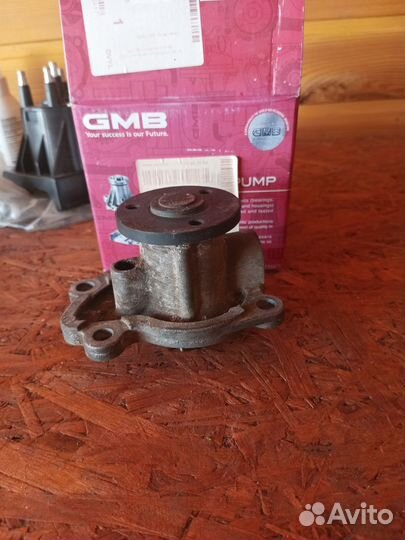 Насос системы охлаждения помпа на Nissan tiida