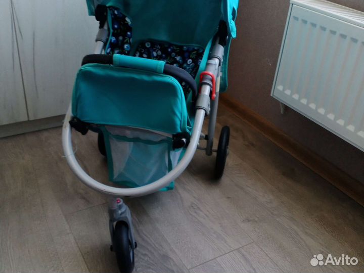 Игрушечная коляска для кукол