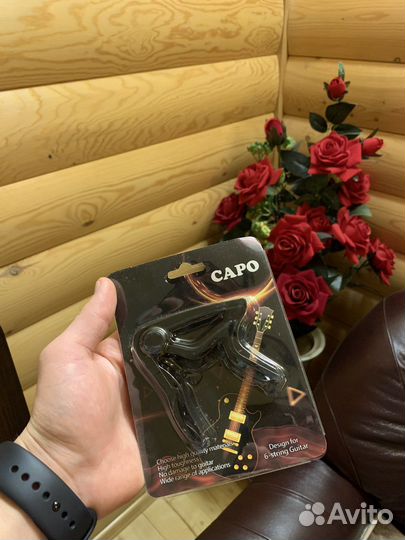 Каподастр для гитары