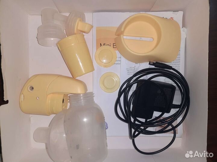 Молокоотсос medela электрический