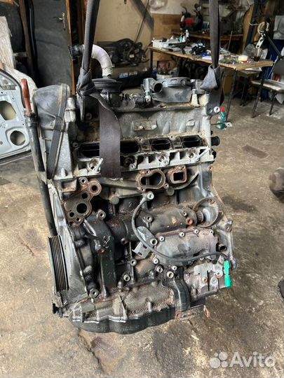 Двигатель Skoda CDA 1.8 06J100035HX 2010