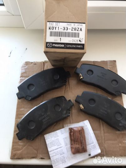 Тормозные колодки передние на mazda
