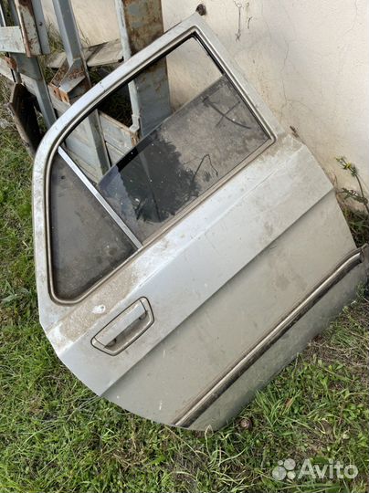 Двери на волгу 3102