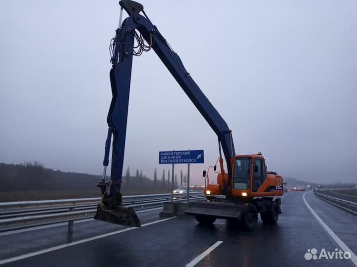 Аренда колесного полноповоротного экскаватора