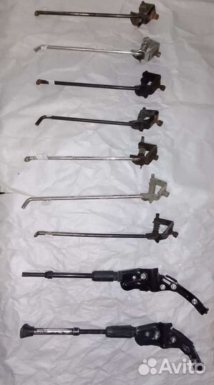 Подножки,велосипедные замки и запчасти