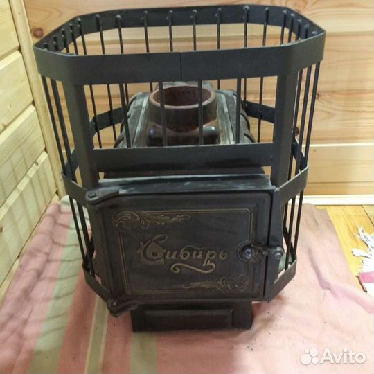 Чугунная печь для бани б/у Сибирь-15 без выноса
