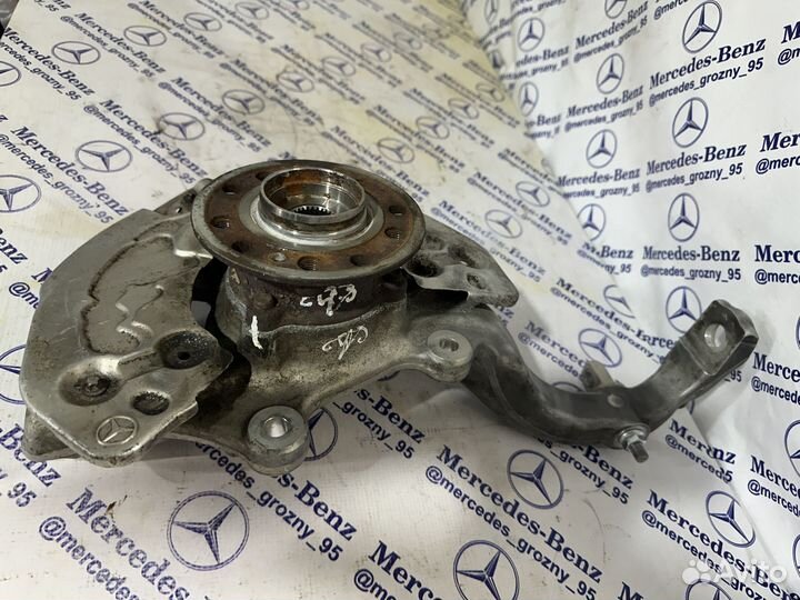 Передняя левая цапфа