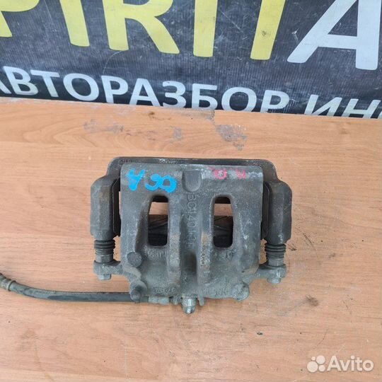 Суппорт тормозной передний правый Kia Mohave 1