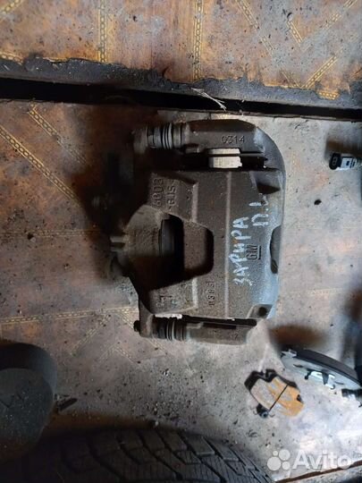 Опель зафира C суппорт тормозной