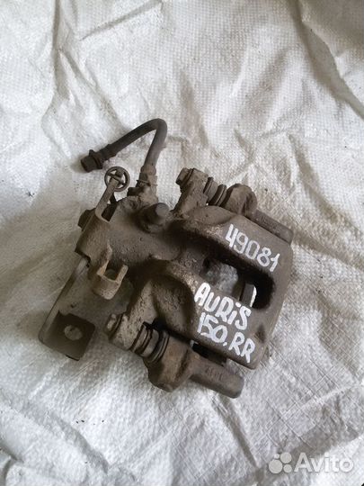 Суппорт тормозной Toyota Auris 150