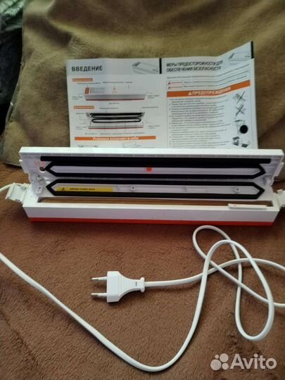 Вакуумный упаковщик вакууматор