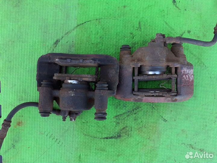 Суппорт передний Mазда 323 F 94-98 г.в