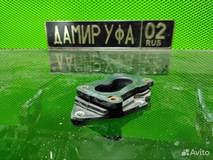 Фланец карбюратора