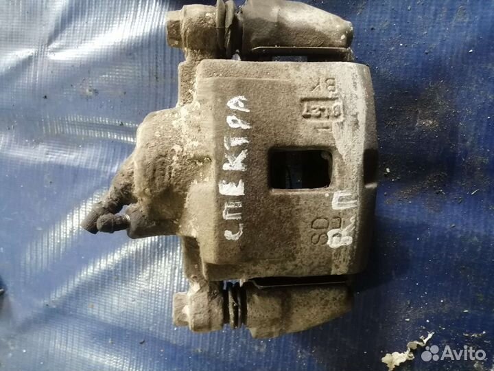 Суппорт передний правый Kia Spectra