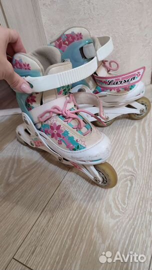 Роликовые коньки