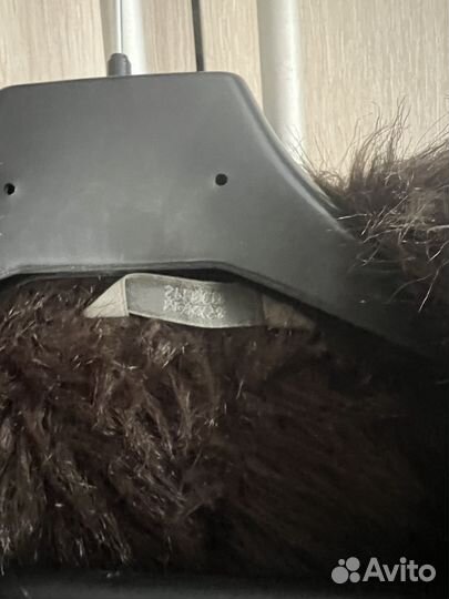 Меховая жилетка