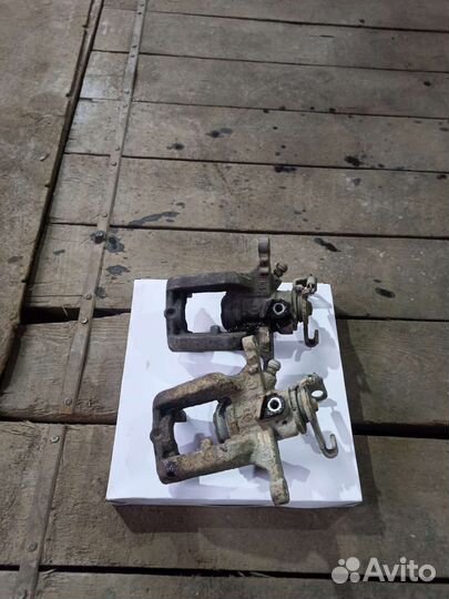 Зад.левый торм супорт Астра j