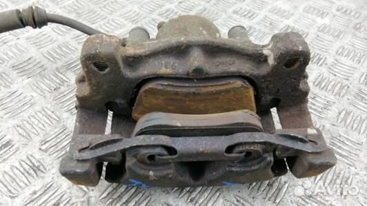 Суппорт тормозной передний левый volvo V60 1 (83T2